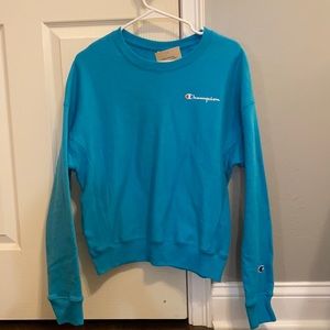 Blue champion crewneck. Size medium. Never worn